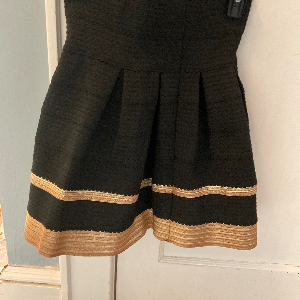 Black skirt with gold accents